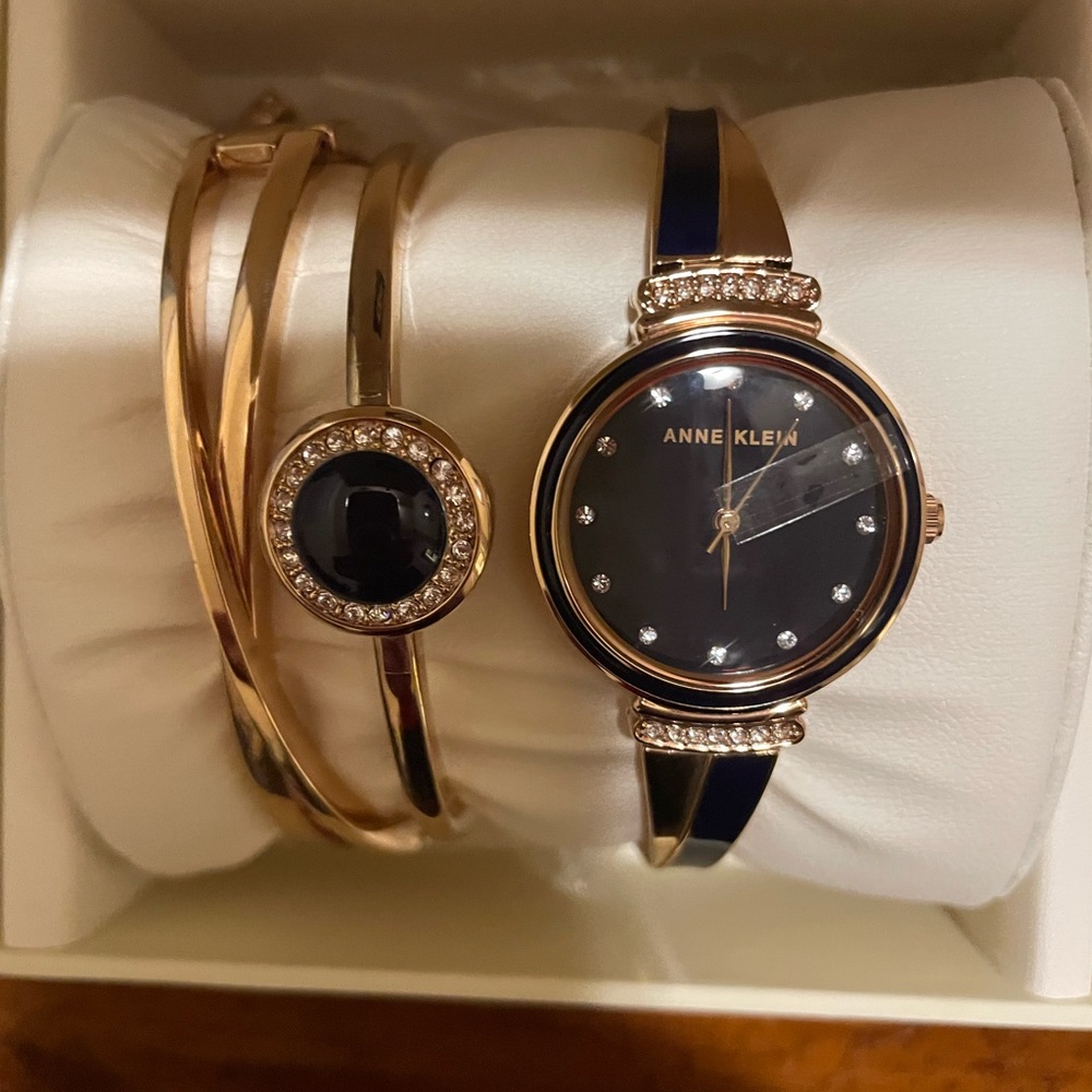 And Klein watch with two bracelets